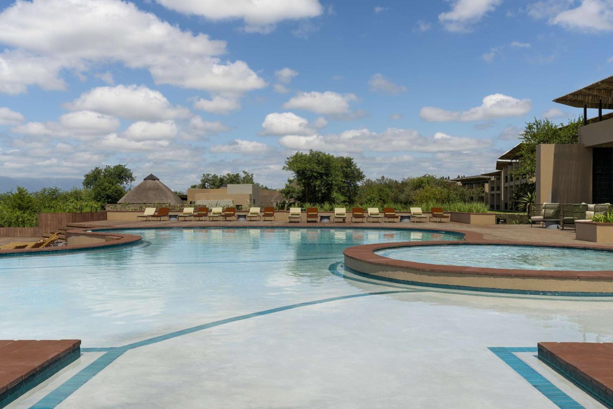 Radisson Safari Hotel Hoedspruit Exterior photo The swimming pool at the Four Seasons Hotel