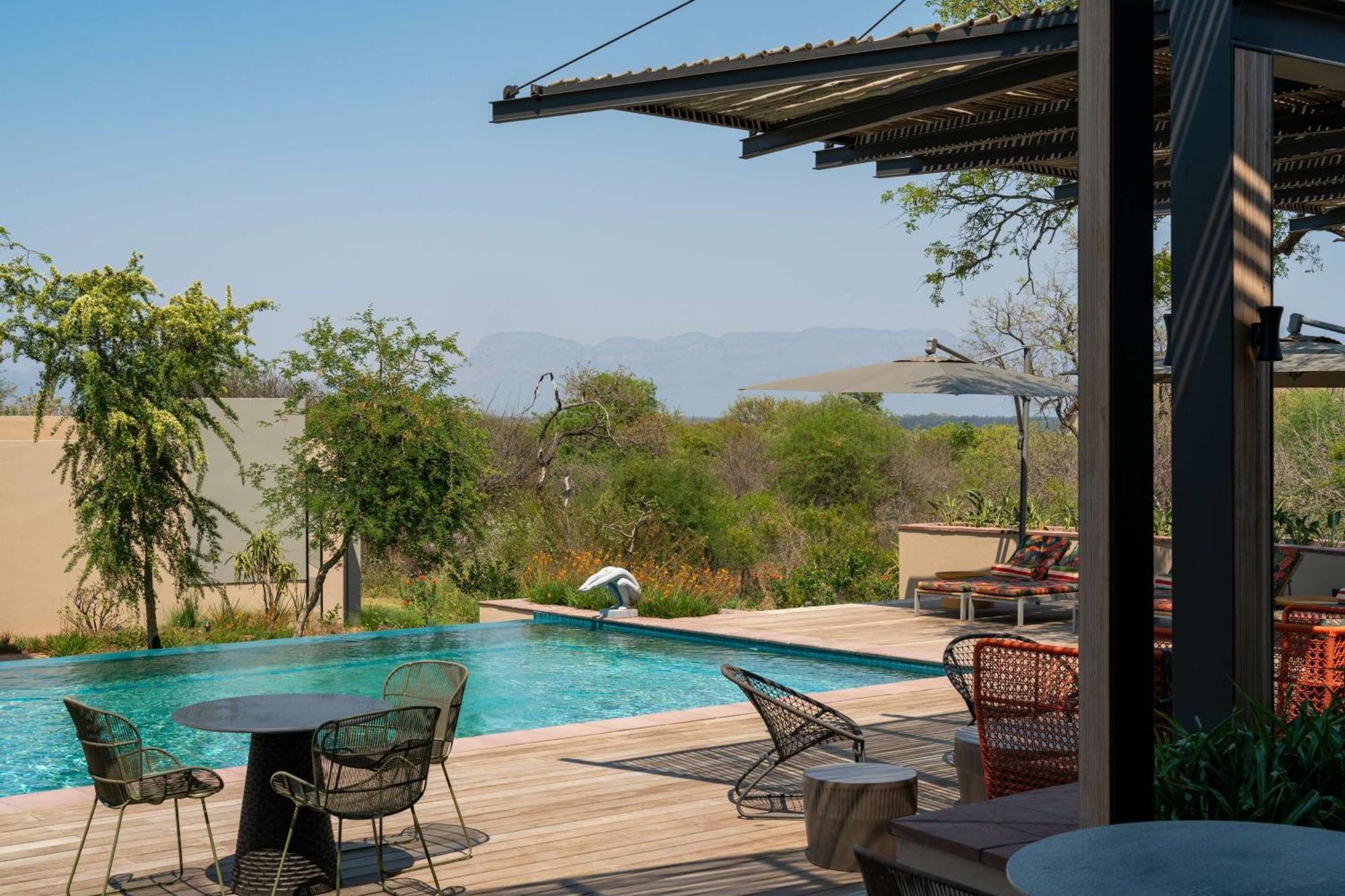 Radisson Safari Hotel Hoedspruit Exterior photo The swimming pool at the resort
